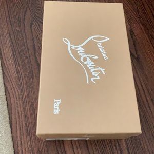 Empty men’s Louboutin shoe box